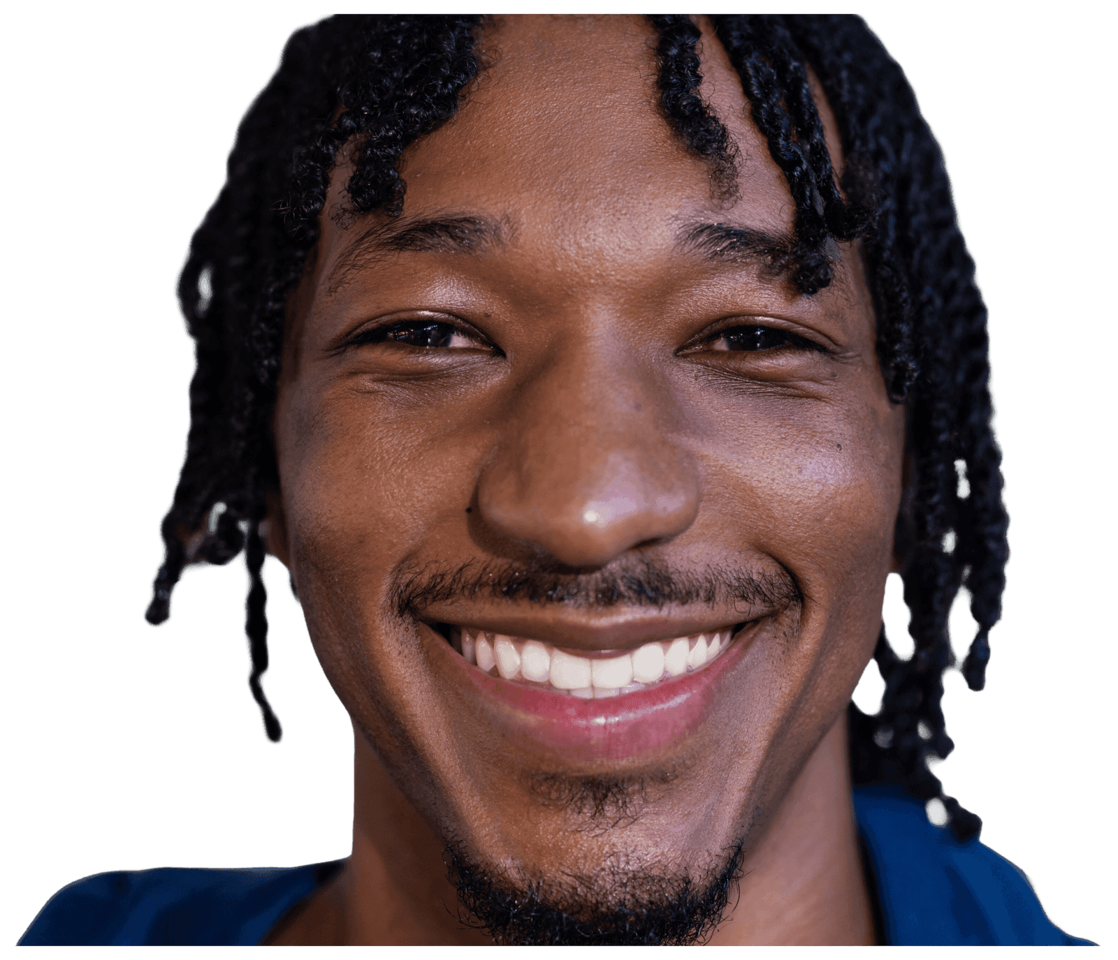 Smiling Black creator with locs