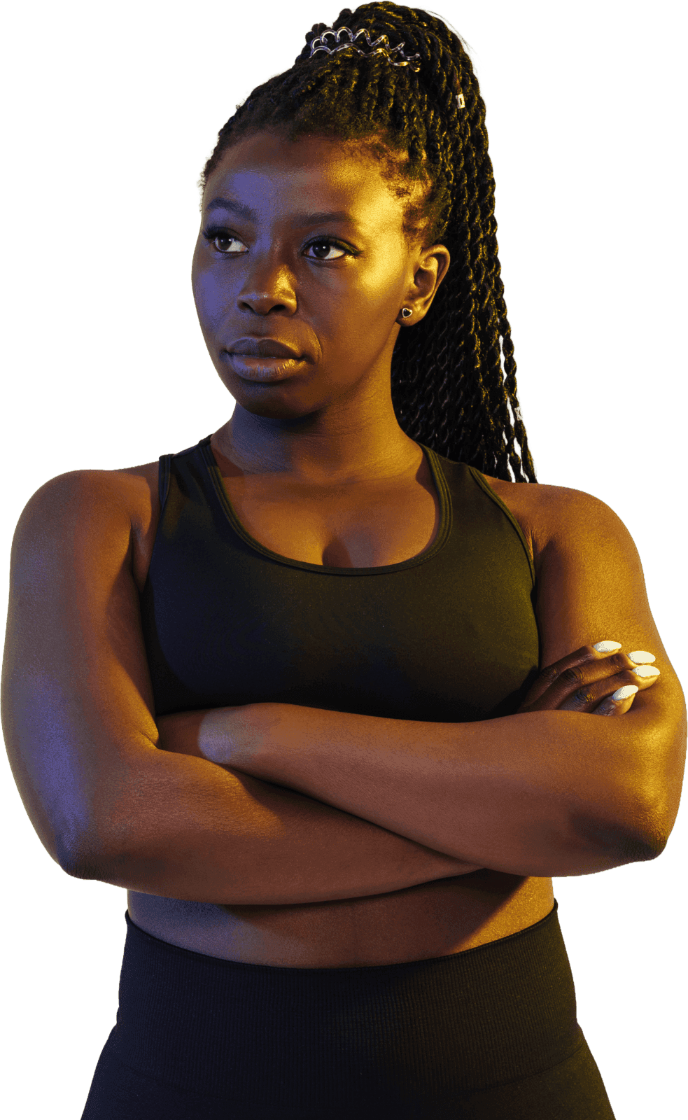 Black creator in athletic wear, arms crossed